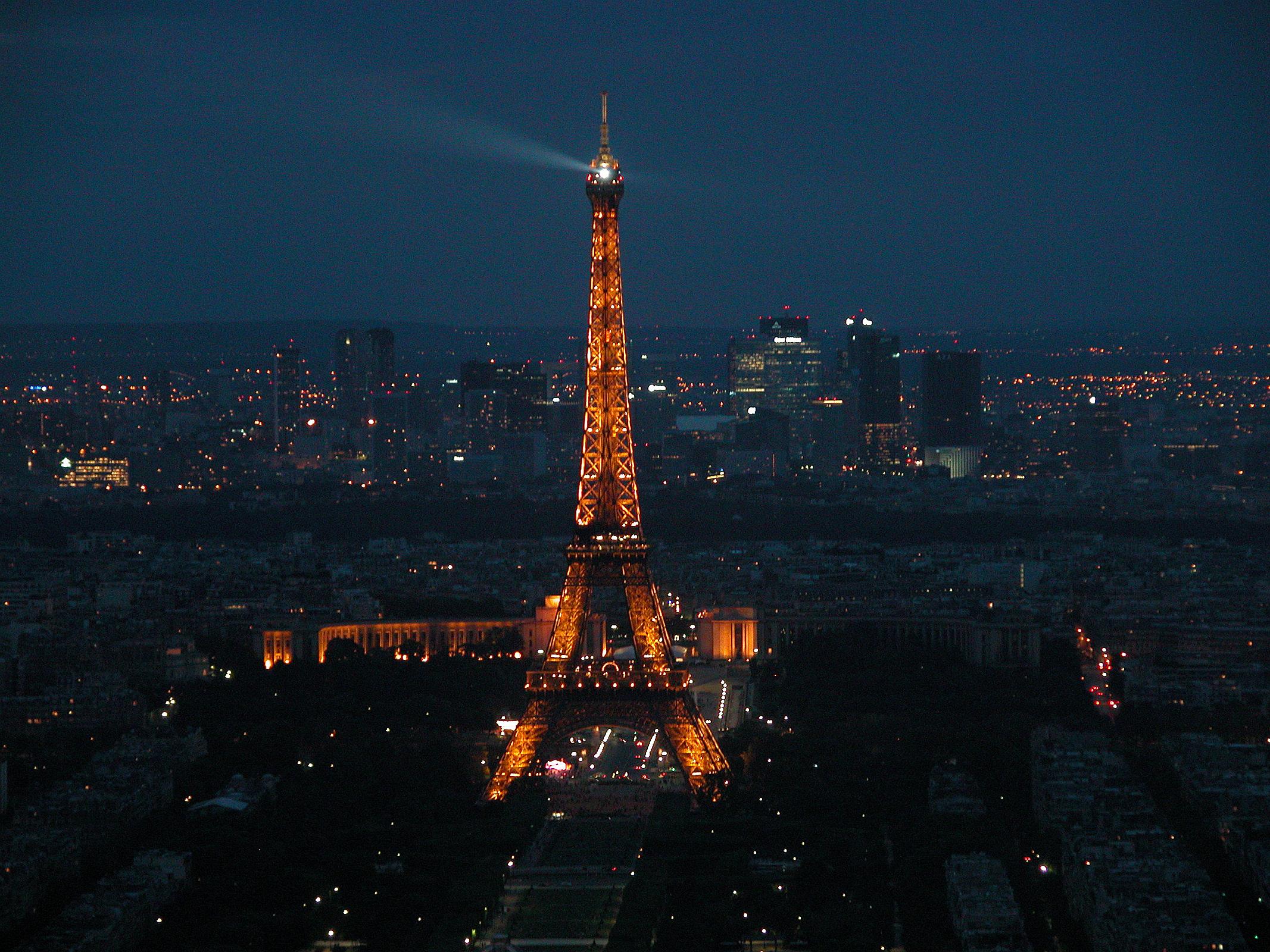 Paris 09 Evening Lights On Eiffel Tower With La Defense Behind From Montparnasse Tower 